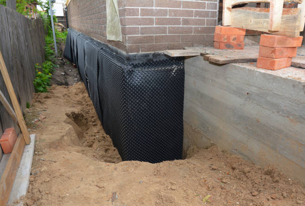 SJ Waterproofing Pros technician performing targeted Waterproofing assessment in Rockvale, TN